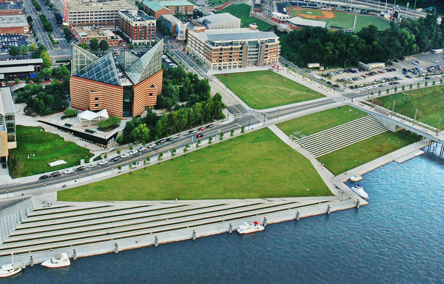 Aerial view of Ross's Landing Park showcasing the Tennessee Aquarium and surrounding green spaces along the waterfront.