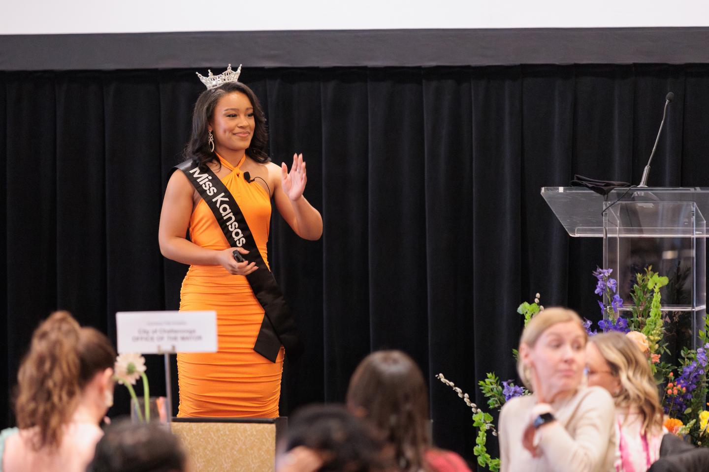 Alexis Smith speaking at women's conference