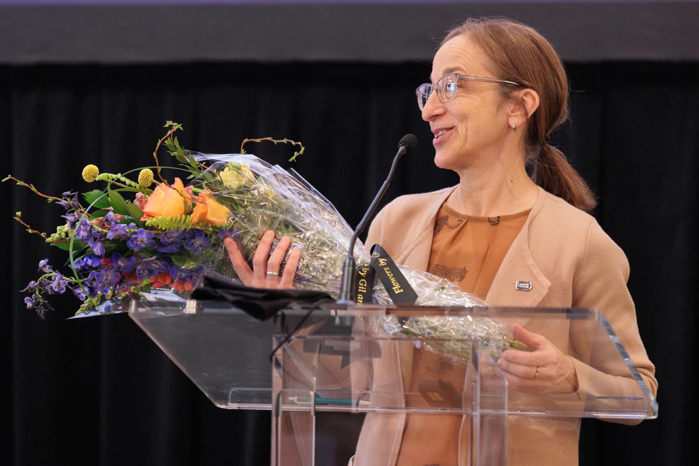 Councilwoman Jenni Berz receiving flowers