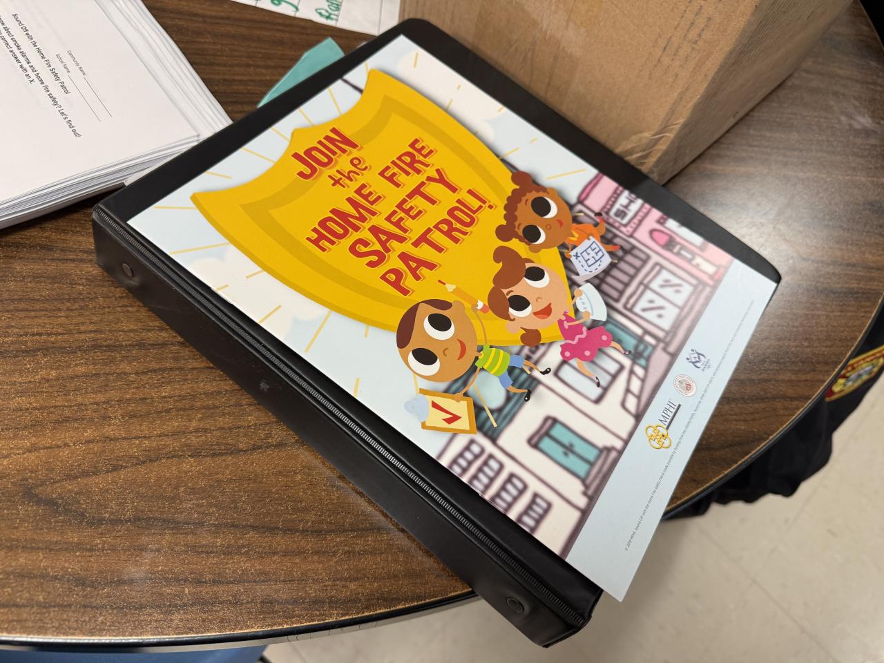 Home Fire Safety Patrol book sitting on a table
