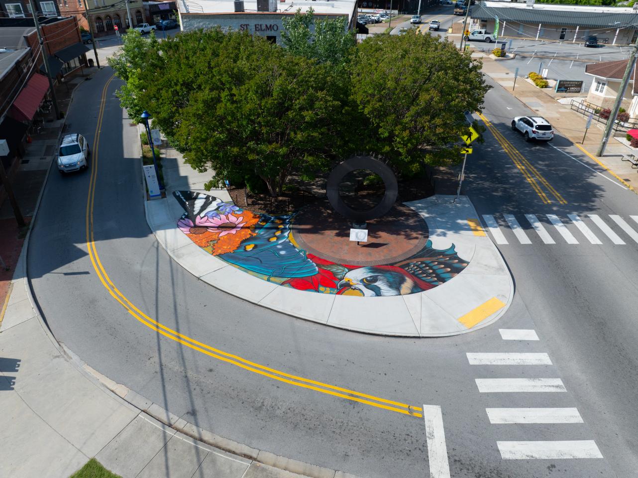 St Elmo Ave Mural Colorful mural on sidewalk next to road