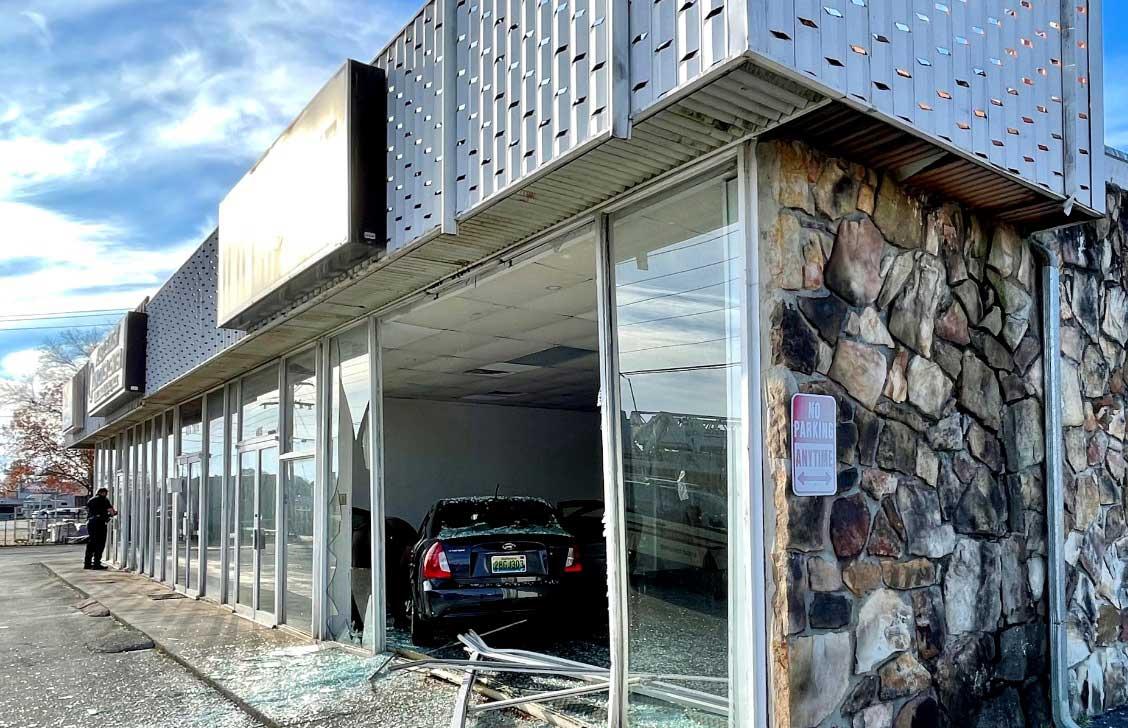 Car ends up inside Highway 58 building