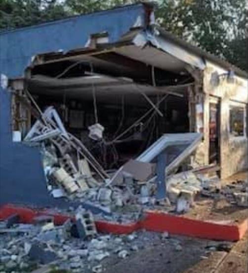 SUV hits barbershop