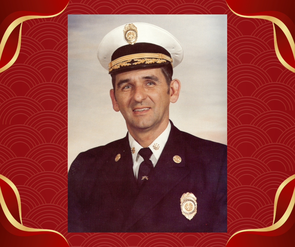 Chief Joe Knowles wearing his dress uniform and smiling