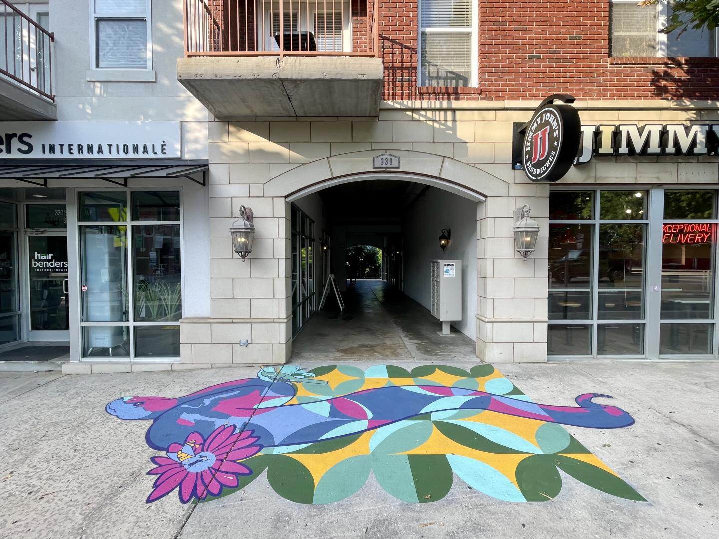 Colorful mural in front of building