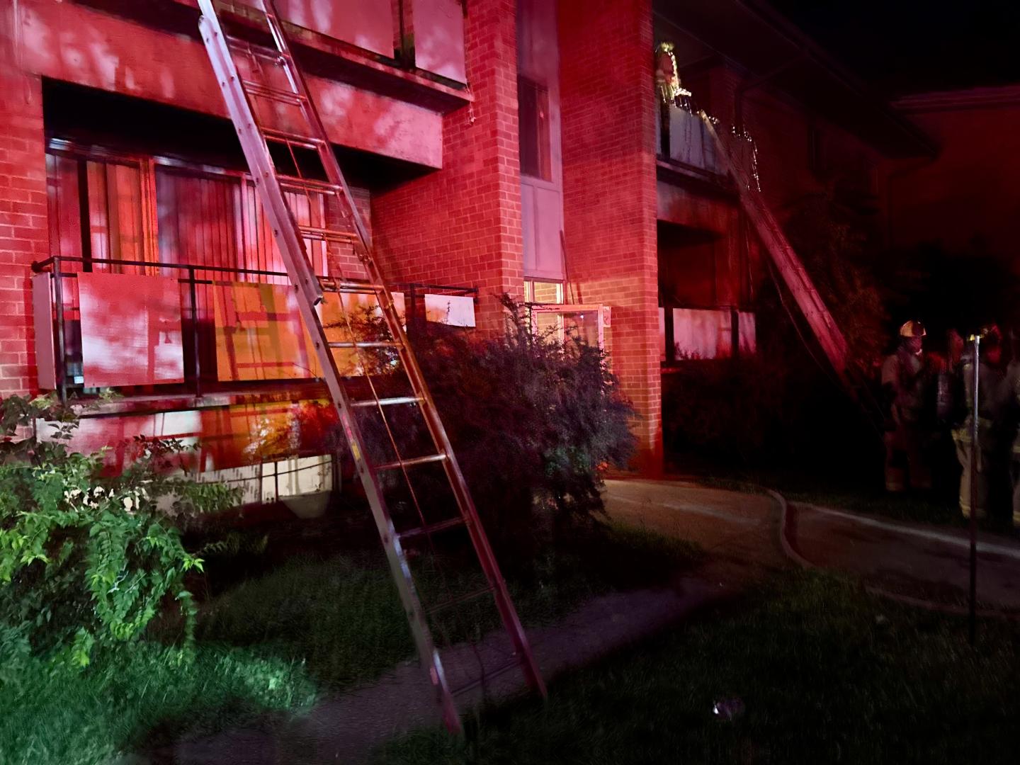 Ladder leaning against building